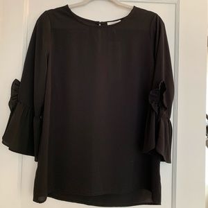 Black Pleione blouse ruffled bell sleeves. S
